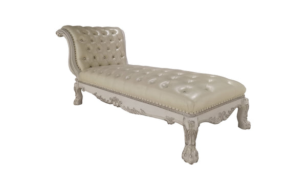  Traditional Style Chaise Bone White Dresden Collection An ornate chaise lounge with a tufted cream leather seat and a distressed white carved frame, shown on a plain white background.