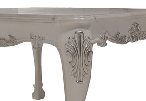 Traditional Style Counter Height Dining Table Bone White Dresden Collection Close-up of an ornate white carved table leg with decorative scrollwork and a smooth tabletop surface, shown against a plain white background.