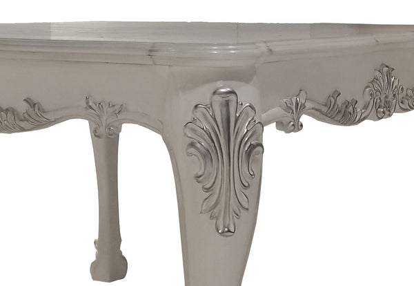 Traditional Style Counter Height Dining Table Bone White Dresden Collection Close-up of an ornate white carved table leg with decorative scrollwork and a smooth tabletop surface, shown against a plain white background.
