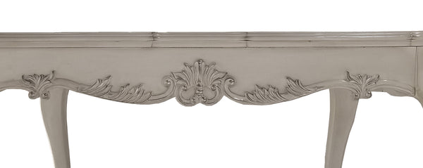 Traditional Style Counter Height Dining Table Bone White Dresden Collection lose-up of an ornate console table with carved floral and scrollwork details in a light gray finish, shown against a white background.