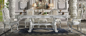 Traditional Style Dining Table Bone White Dresden Collection Elegant dining room set with ornate furniture in a luxurious interior setting.