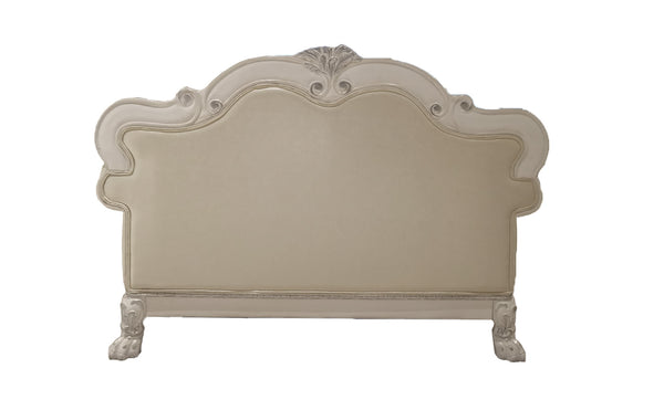 Traditional Style Loveseat Bone White Dresden Collection An ornate upholstered headboard with a curved, baroque-style frame, featuring carved details and clawfoot legs, shown against a plain white background.