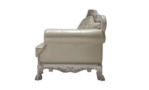 Traditional Style Loveseat Bone White Dresden Collection An ornate cream-colored leather loveseat with a carved silver-painted frame, shown from a three-quarters angle against a plain white background.