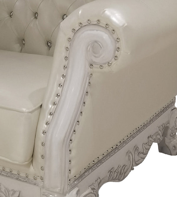 Traditional Style Sofa Bone White Dresden Collection Decorative armchair with intricate detailing and studded embellishments.