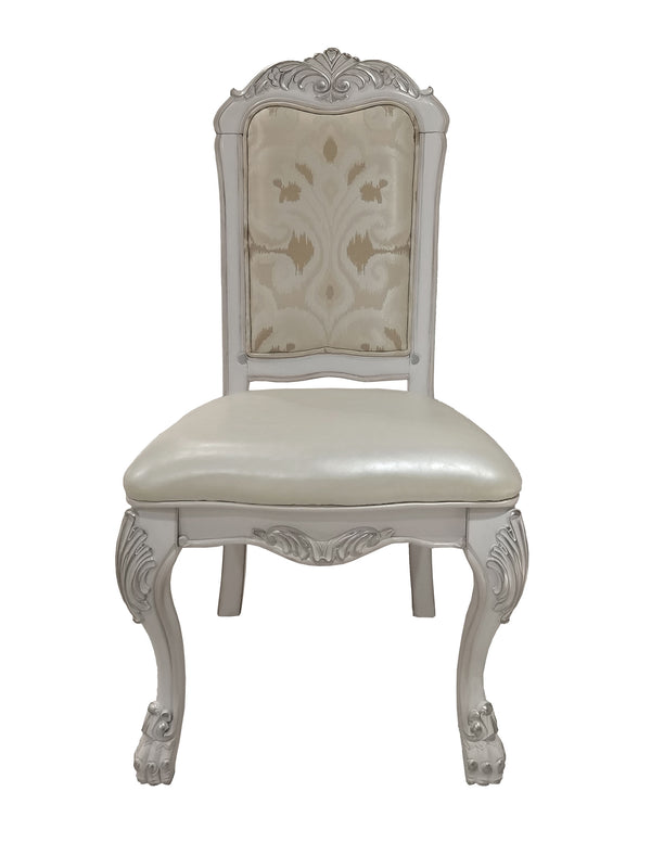 Traditional Style Dining Chair Bone White Dresden Collection An ornate baroque-style dining chair with a carved white wooden frame, a cream upholstered seat, and a patterned beige and cream backrest, shown against a plain white background.