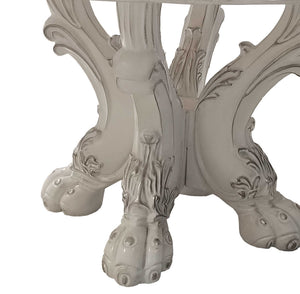Traditional Style Round Dining Table Bone White Dresden Collection An ornate white carved table base with sculpted legs and leaf-like flourishes, photographed against a plain white background.