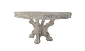 Traditional Style Round Dining Table Bone White Dresden Collection An ornate round console table with a distressed white finish, featuring a carved pedestal base with sculpted claw-like feet and decorative scrollwork on the apron.