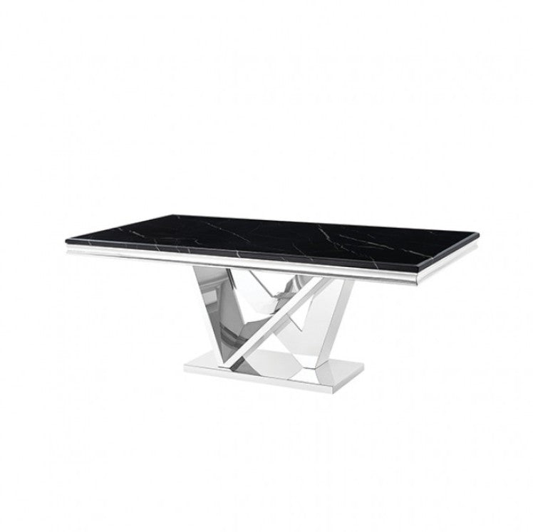 Valdi Silver Black Sintered Stone Top Dining Table A modern rectangular dining table with a glossy black top and a polished chrome geometric X-shaped pedestal base, styled in a bright, elegant dining room with beige paneled walls and marble floors.