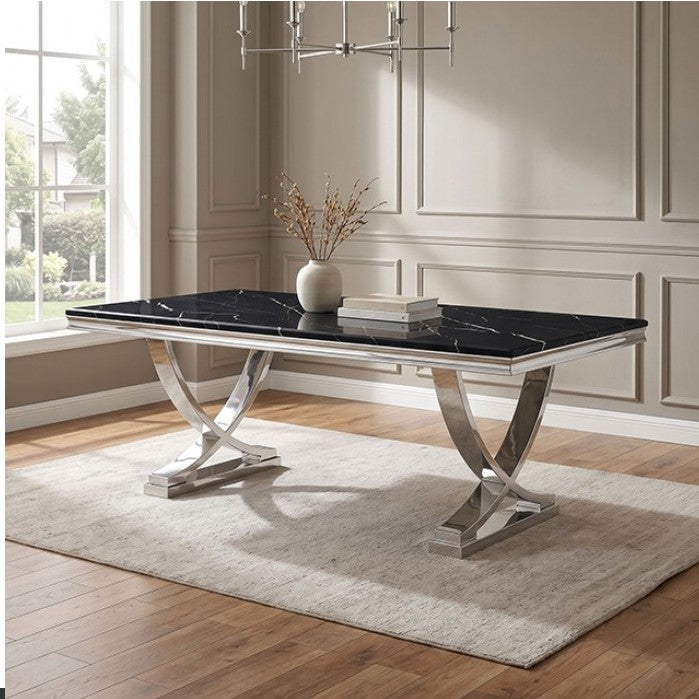 Valdi Silver Black Sintered Stone Top V-Style Pedestal Dining Table A rectangular dining table with a glossy black marble top and polished silver metal legs, styled on a light beige rug in a modern room with wood floors and paneled walls.