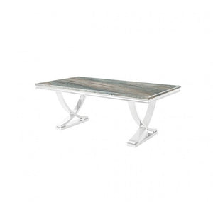 Valdi Silver Gray Sintered Stone Top V-Style Pedestal Dining Table A rectangular dining table with a green and gray marble-patterned top and a polished silver metal base with curved legs, shown on a plain white background.