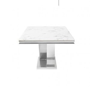 Valdi Silver White Sintered Stone Top Dining Table A modern square dining table featuring a white marble tabletop with subtle gray veining and a polished chrome pedestal base, shown against a plain white background.