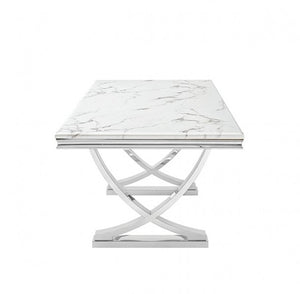 Valdi Silver White Sintered Stone Top V-Style Pedestal Dining Table A square dining table featuring a white marble-patterned top with gray veining and a polished chrome X-shaped pedestal base, shown against a plain white background.