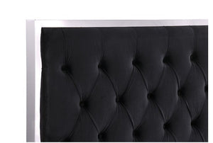 Vasiko Contemporary Glam Chrome Black Fabric Bed A close-up of a black tufted upholstered headboard with a white frame against a white background.