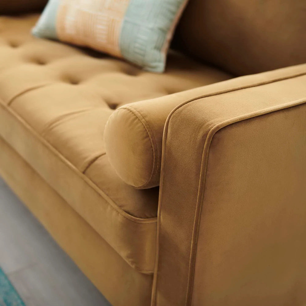 Vaspire Modern Cognac Velvet Performance Loveseat Brown sofa with cushions in a bright living room with large windows.