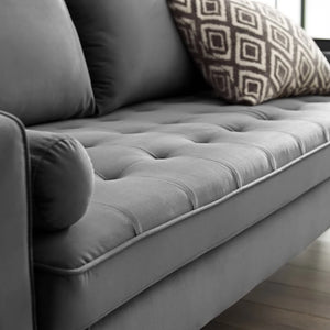 Vaspire Modern Gray Velvet Performance Sofa Gray tufted sofa with patterned pillow on a wooden floor