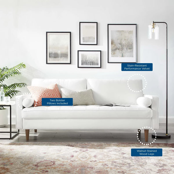 Vaspire Modern White Velvet Performance Sofa White sofa with decorative pillows in a living room setting, featuring text labels on various product features.
