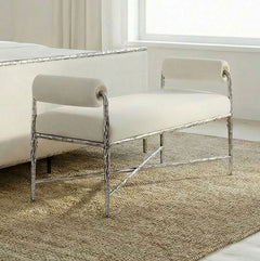 Vilber Gunmetal Silver Fully Upholstered Bench White bench with silver metal frame in a room with a window and rug.