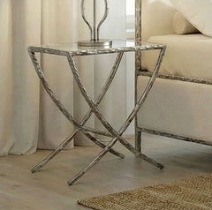 Vilber Gunmetal Silver Side Table Decorative side table with marble-like finish in a living room setting