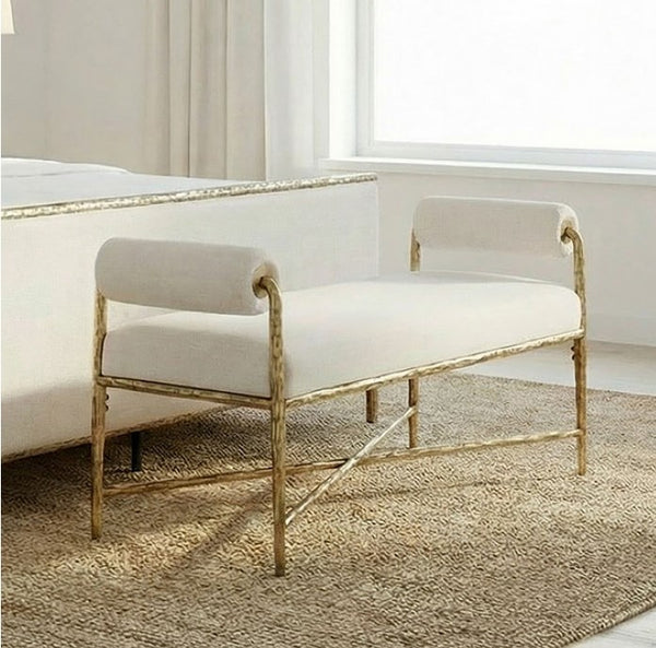 Vilber Matte Gold Bench Beige bench with gold frame in a room with a bed and window.