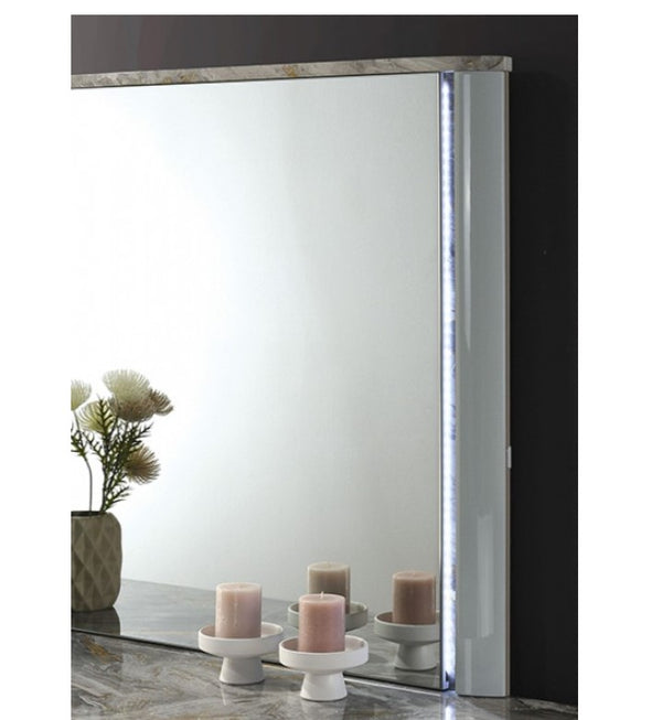 Vincenzo Modern High Gloss Finish Mirror Large rectangular mirror with decorative candles and a plant on a reflective surface.