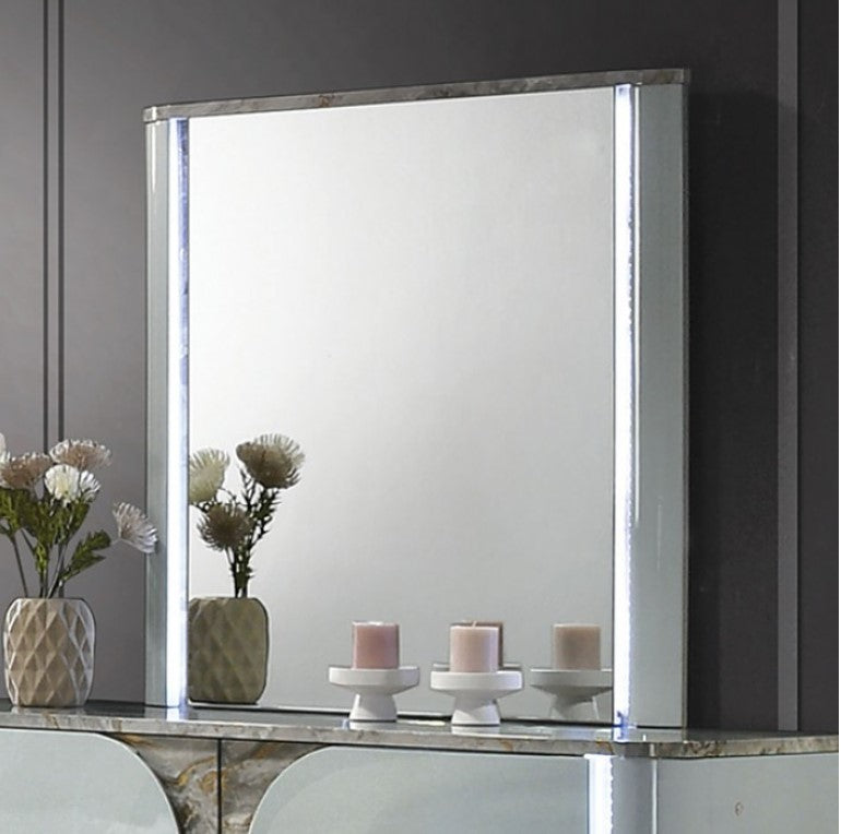 Vincenzo Modern High Gloss Finish Mirror Large rectangular mirror on a dark wall with decorative elements below.