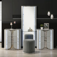 Vincenzo Modern High Gloss Finish Vanity Set Modern interior design with marble-textured furniture and gray stools.