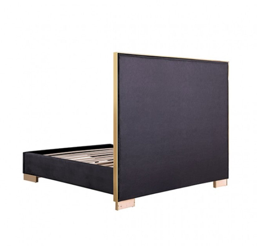 Violla Silver Black Glam Upholstered Bed A modern black bed frame with a geometric patterned headboard, styled in a contemporary bedroom with matching black nightstands, lamps, and a gray rug.