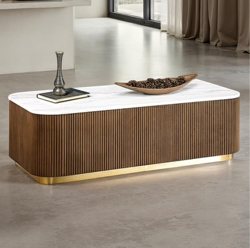Modern coffee table with marble top and wooden base in a room setting