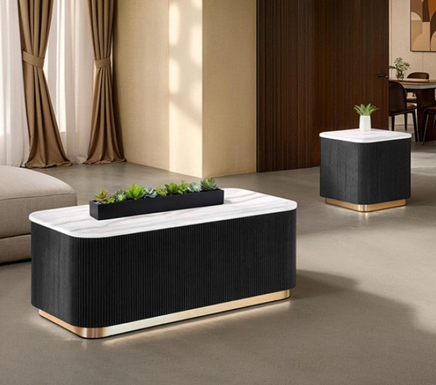 Modern coffee table with a black and white design in a living room setting.