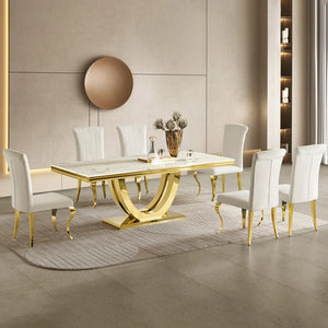 #White & Gold  Modern dining room with a gold and white table and chairs.