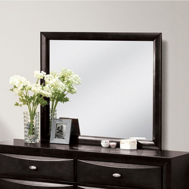 Zaven Transitional Black Mirror Dresser with a large mirror and decorative items on a plain wall.