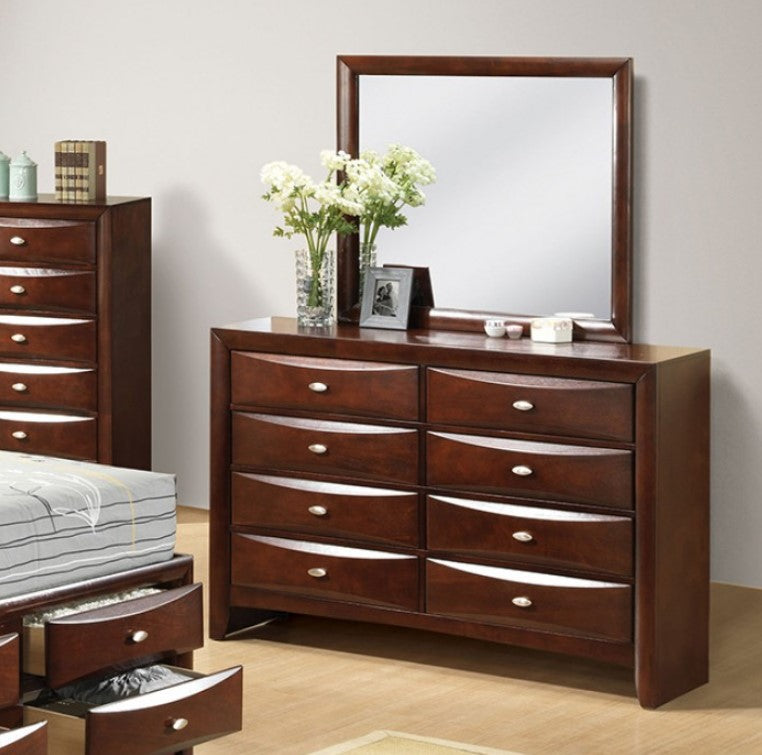 Zaven Transitional Dark Cherry Mirror Wooden dresser with a large mirror, flowers, and decorative items on top against a plain wall.