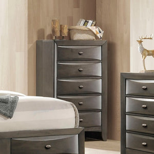 Zaven Transitional Gray Storage Chest Gray bedroom furniture set with two dressers and a bed against a neutral wall.